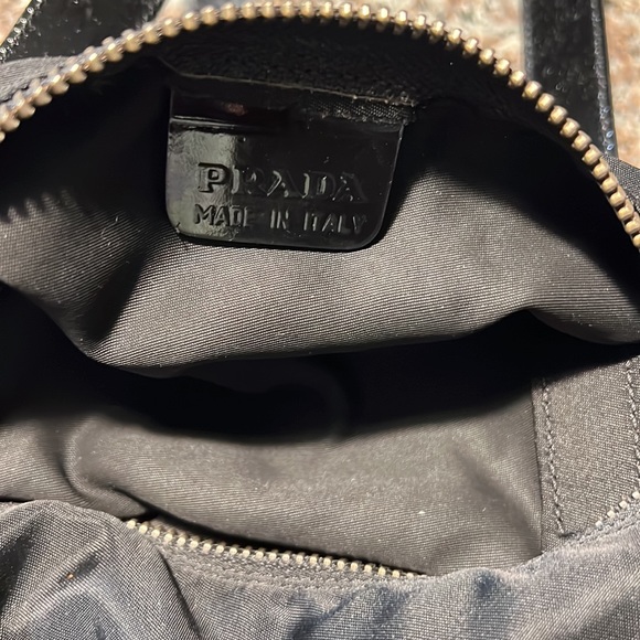 It’s a Prada hand bag in great condition I have used it twice - Picture 2 of 4
